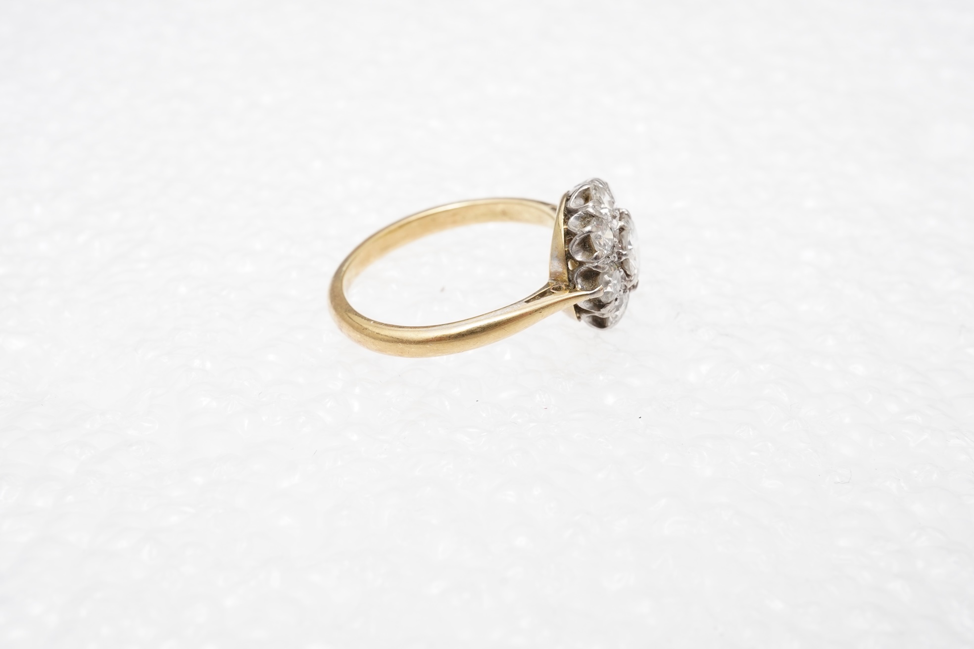 A diamond cluster ring